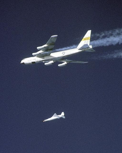 NASA image: A modified Pegasus rocket drops away after release from NASA's B-52B before accelerating the X-43A over a Pacific Ocean test range on Nov. 16, 2004
