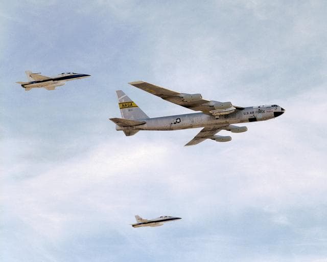 NASA image: NASA's B-52B mothership, escorted by two F-18s, makes a final flyover after its last research mission that launched the X-43A on its record Mach 9.6 flight