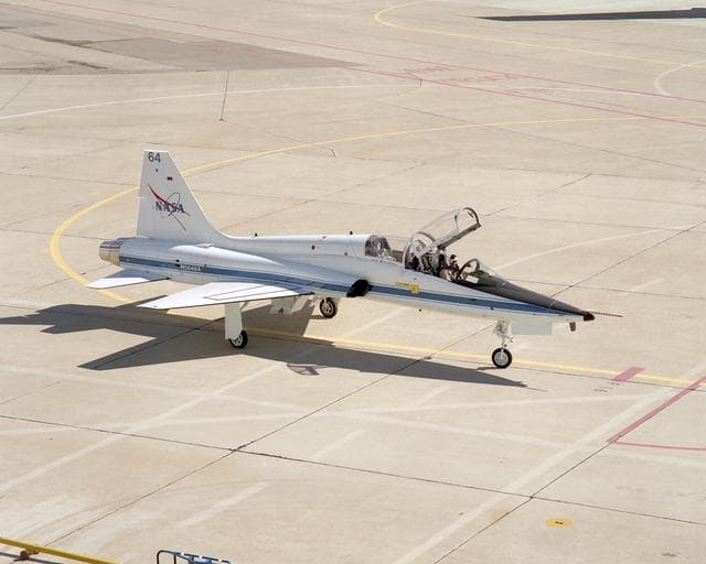 NASA image: Pilot Gordon Fullerton taxies NASA Dryden's "newest" mission support aircraft, a T-38 Talon, into position on the ramp upon its arrival on February 24, 2005