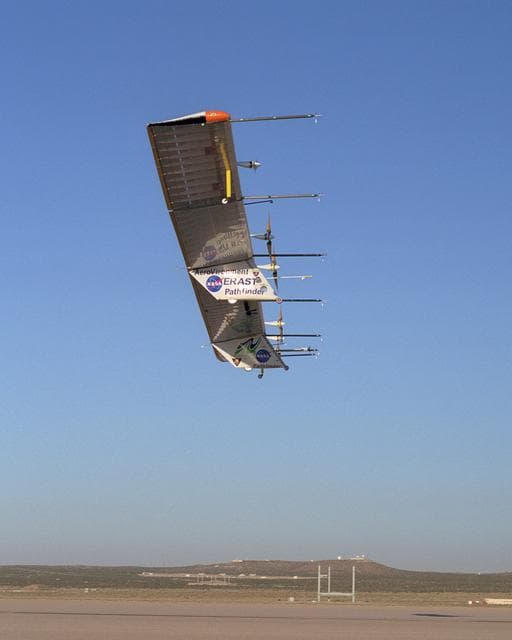 NASA image: The Atmospheric Turbulence Measurement System booms are clearly evident in this view of the Pathfinder-Plus solar aircraft as it flies over Rogers Dry Lake.