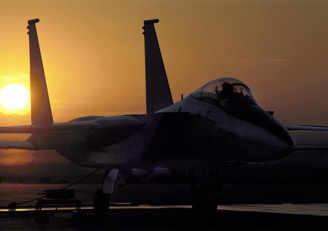 F-15 HiDEC taxi on ramp at sunrise 