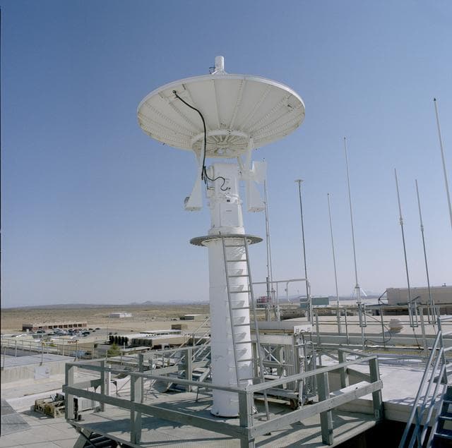 NASA image: Helicopter Removes Historic Rooftop Pedestal