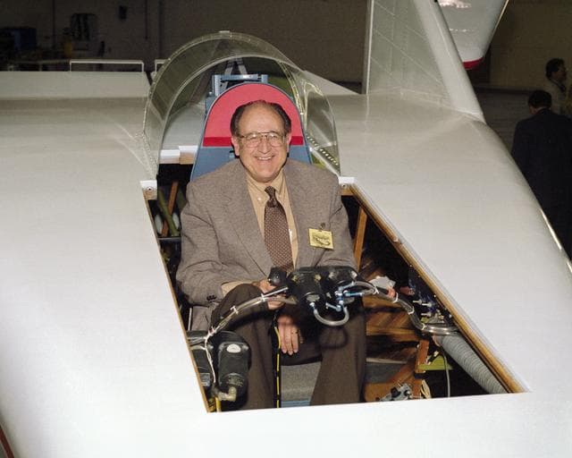 NASA image: Often called the "Father of the Lifting Bodies," NASA aerospace engineer Dale Reed enjoys a moment in the cockpit of the restored wingless M2-F1 in 1997.