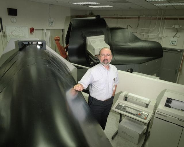 NASA image: Electronics technician Joe Ciganek was responsible for operation and maintenance of the SR-71 simulator while it was at NASA's Dryden Flight Research Center.