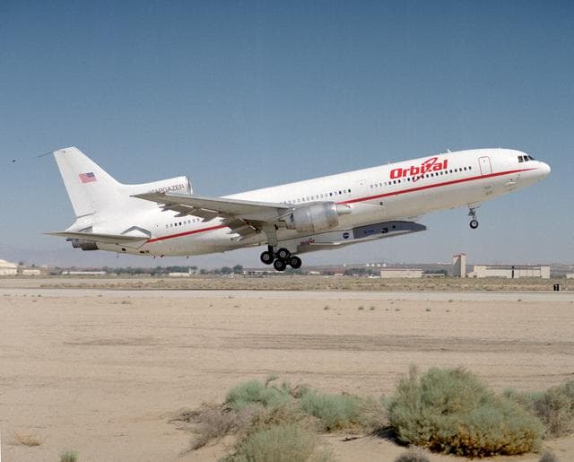 NASA image: X-34 mated to modified L-1011 during takeoff on first captive carry flight