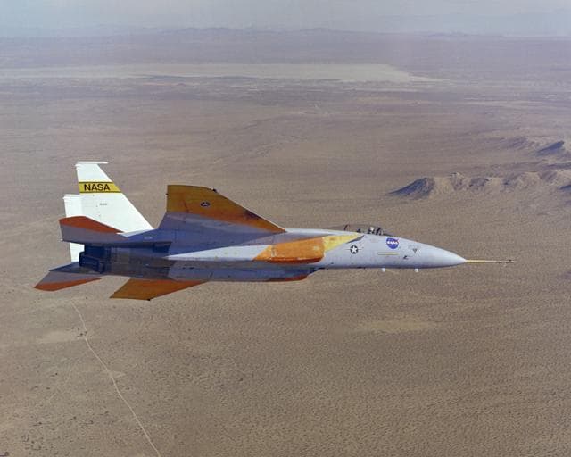 NASA image: F-15A in flight closeup of 10 degree cone experiment