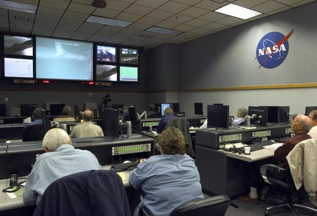 NASA image: NASA engineers monitor mission progress from a Dryden control room prior to launch of the X-43A scramjet and its booster from NASA's B-52B mothership