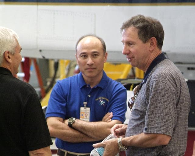 NASA image: NASA Administrator Michael Griffin (right) with Kevin Petersen (left) and Stephen Corda (center) during Griffin's visit to NASA Dryden