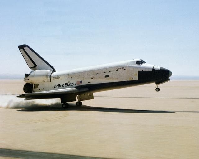 NASA image: The Space Shuttle Columbia touches down on lakebed runway 23 at Edwards Air Force Base, Calif., to conclude the first orbital shuttle mission