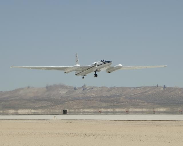 NASA image: NASA'S ER-2 #806 lifts off from Edwards Air Force Base on a CALIPS/CloudSat validation instrument checkout flight.
