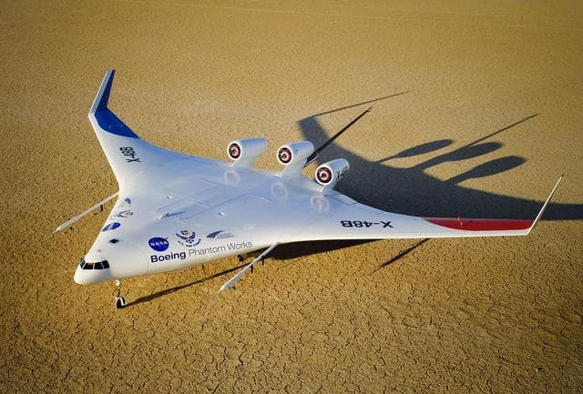 NASA image: Boeing's X-48B Blended Wing Body technology demonstrator shows off its unique lines at sunset on Rogers Dry Lake adjacent to NASA DFRC