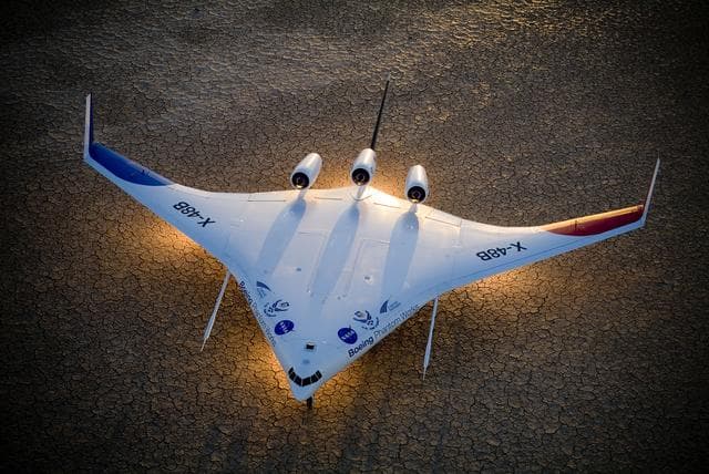 NASA image: Boeing's X-48B Blended Wing Body technology demonstrator shows off its unique lines at sunset on Rogers Dry Lake adjacent to NASA DFRC