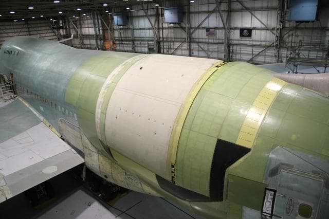 NASA image: A rotating external door (white) was installed over the telescope cavity in the rear fuselage of NASA's SOFIA Boeing 747SP during modifications in Waco, Texas