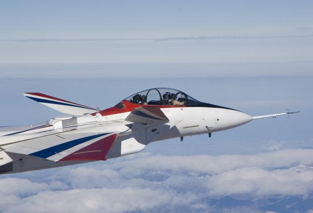 NASA image: Range safety and phased-array range user system antennas validated in the ECANS project can be seen just behind the cockpit on NASA's NF-15B research aircraft.