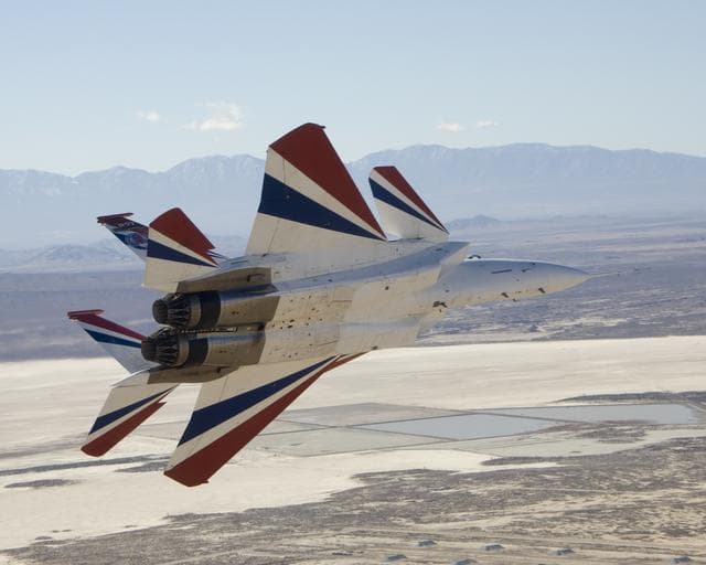 NASA image: Two small Range Safety System antennas are located just behind the engine inlets of NASA's NF-15B research aircraft as it banks away from the chase plane.