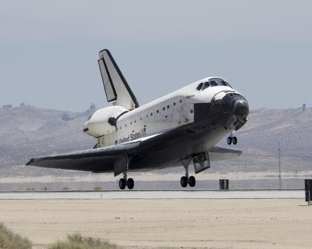 NASA image: The Space Shuttle Atlantis touches down at Edwards AFB on June 22, 2007, to conclude International Space Station construction and supply mission STS-117