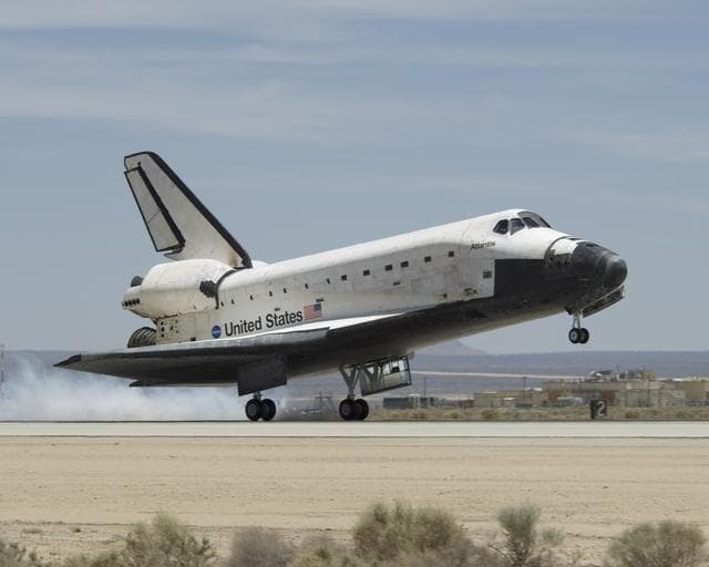 NASA image: The Space Shuttle Atlantis touches down at Edwards AFB on June 22, 2007, to conclude International Space Station construction and supply mission STS-117