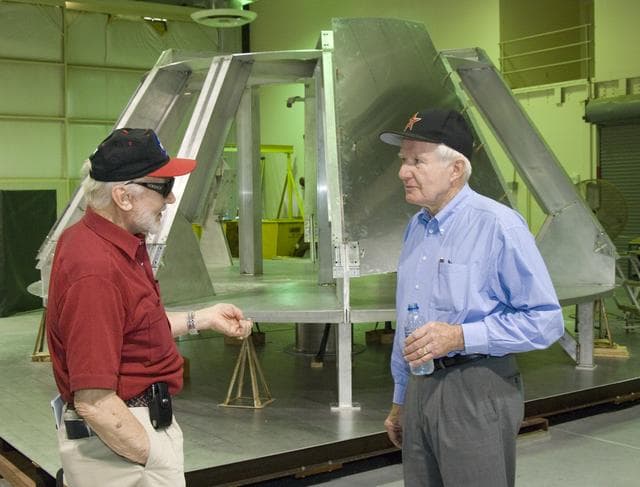NASA image: Apollo 11 astronaut Buzz Aldrin (left) and Apollo-Soyuz and space shuttle astronaut Vance Brand discuss Dryden's work on an Orion fit-check crew module mockup