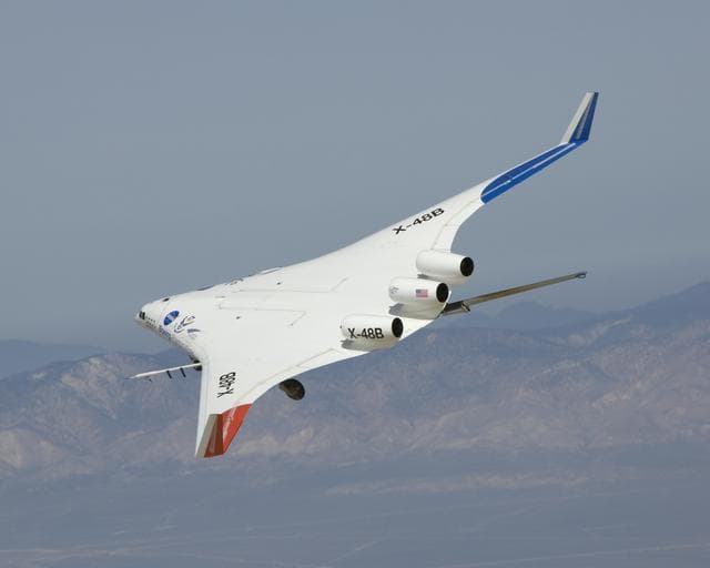 NASA image: The X-48B Blended Wing Body research aircraft banks smartly in this Block 2 flight phase image