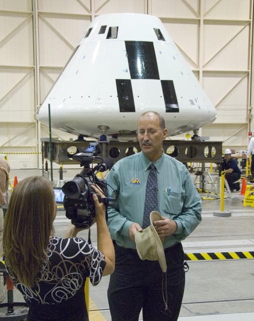 NASA image: Reporter Julie Flannery of KERO-TV, Bakersfield, interviews NASA Dryden's Orion AFT project manager Gary Martin in front of the Orion PA-1 crew module.