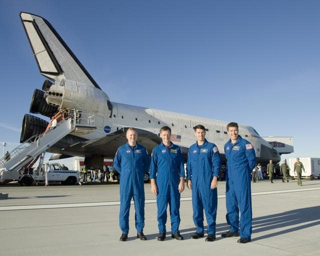 NASA image: STS-126 crewmen Eric Boe, Chris Ferguson, Robert Kimbrough and Stephen Bowen pose in front of the Space Shuttle Endeavour following landing Nov. 30, 2008