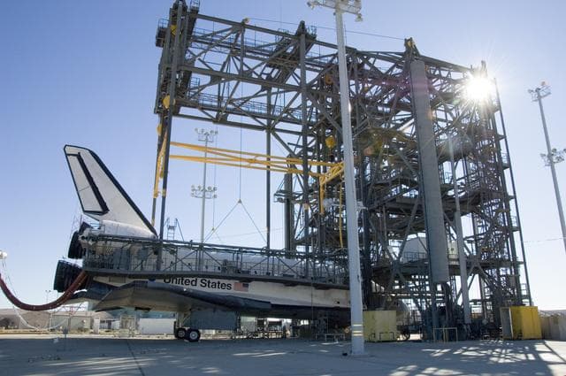 NASA image: The Space Shuttle Endeavour is nestled in the Mate-DeMate Device at NASA DFRC as turnaround operations get underway for its ferry flight back to KSC in Florida