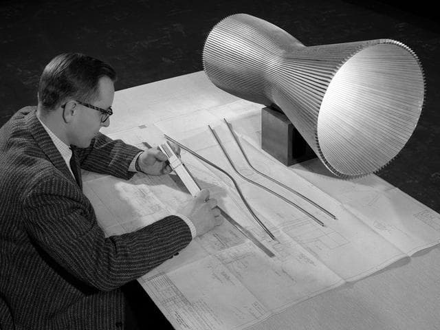 NASA image: NASA Engineer Examines the Design of a Regeneratively-Cooled Rocket Engine