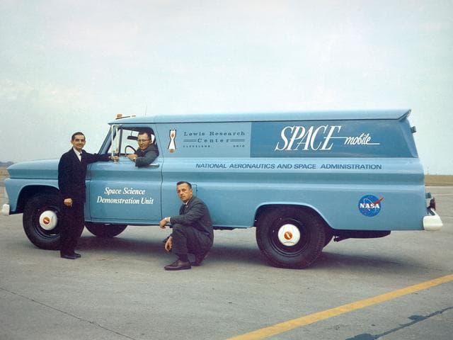 NASA image: Lewis Educational Services Staff with a Spacemobile Vehicle