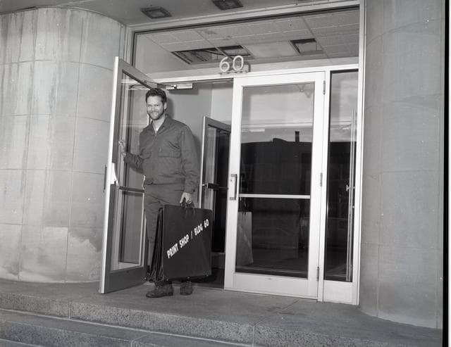 NASA image: Cortez III Employee Delivers Work Between the Print Shop and the Building 60 Graphics Department