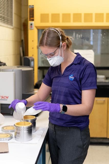 NASA image: Passive Charge Dissipating Work Function Matching Coating for Reducing Adhesion of Lunar Dust 