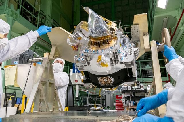 NASA image: OCI Optical Module Reorientation on Rotational Fixture
