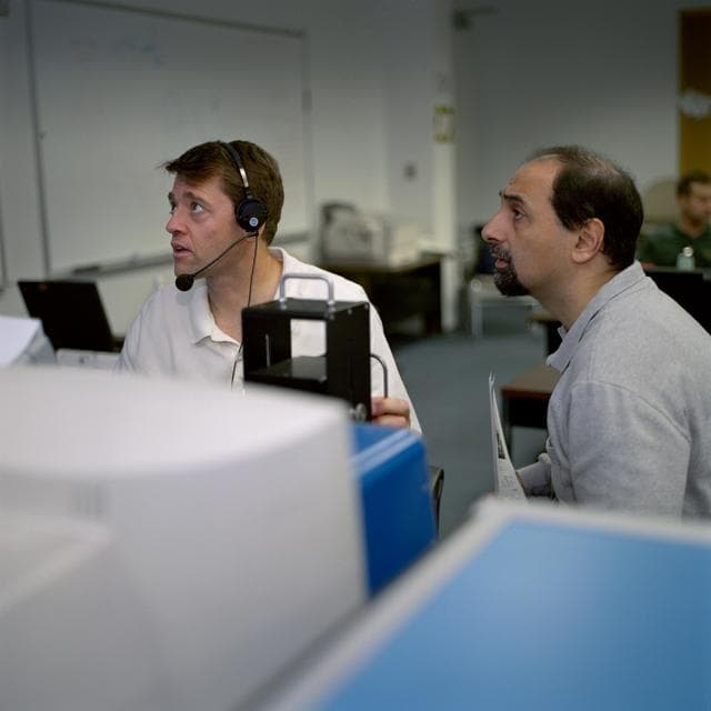 NASA image: STS-100 crewmembers prepare to train in NBL