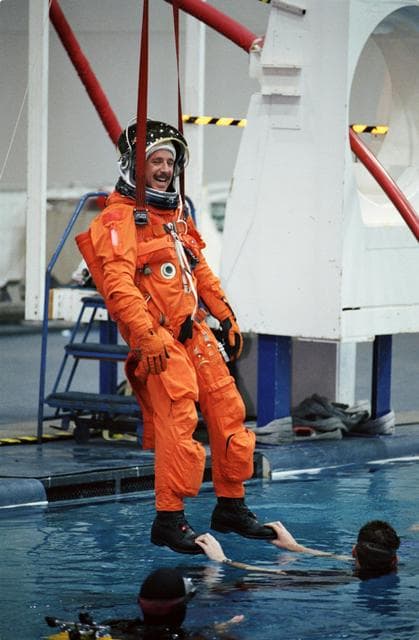 NASA image: STS-105 preflight water survival training in NBL pool in SCTF