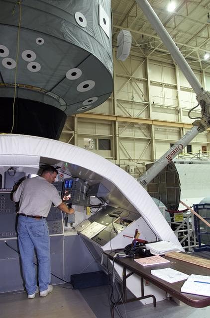 NASA image: Views of STS-106 Pilot Scott Altman training with the RMS arm