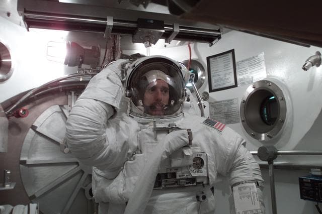 NASA image: STS-104 Crew Training of Jim Reilly in EMU fit check