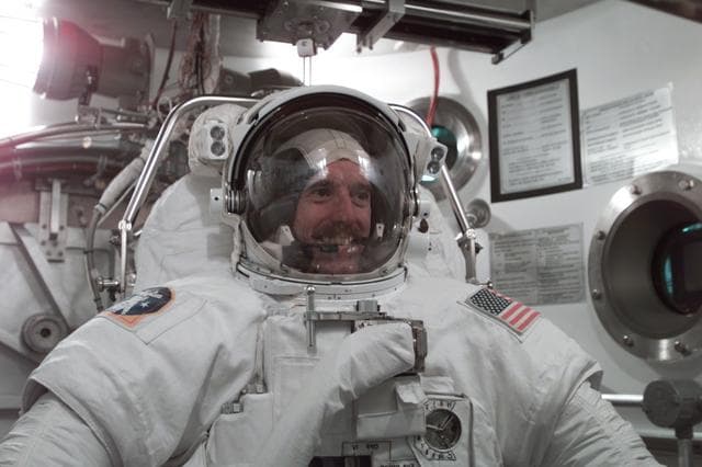 NASA image: STS-104 Crew Training of Jim Reilly in EMU fit check