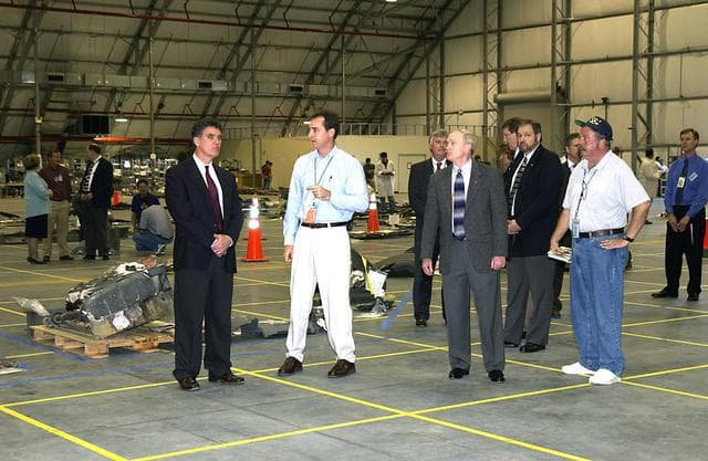 NASA image: STS-107 - Congressman Dave Weldon examines debris