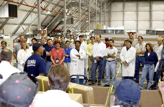 NASA image: KENNEDY SPACE CENTER, FLA. - The Columbia Reconstruction Project team meets before arrival of the final shipment of Columbia debris.  The recovery efforts have been concluded in East Texas.  Prior to this final shipment, the total number of items at KSC is 82,567, weighing 84,800 pounds or 38 percent of the total dry weight of Columbia.  Of those items, 78,760 have been identified, with 753 placed on the left wing grid in the RLV Hangar.