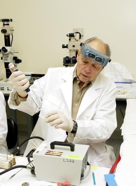 NASA image: KENNEDY SPACE CENTER, FLA. -  Dr. Dennis Morrison, NASA Johnson Space Center, processes one of the experiments carried on mission STS-107. Several experiments were found during the search for Columbia debris. Included in the Commercial ITA Biomedical Experiments payload on mission STS-107 are urokinase cancer research, microencapsulation of drugs, the Growth of Bacterial Biofilm on Surfaces during Spaceflight (GOBBSS), and tin crystal formation.