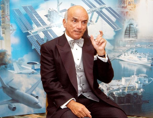 NASA image: KENNEDY SPACE CENTER, FLA. - Dennis Tito, the first private citizen to visit the International Space Station, shares his experiences with visitors at the 40th  Space Congress.  Held April 29-May 2, 2003, in Cape Canaveral, Fla., the Space Congress is an international conference that gathers attendees from the scientific community, the space industry workforce, educators and local supporting industries.  This year's event commemorated the 40th anniversary of the Kennedy Space Center and the Centennial of Flight.  The theme for the Space Congress was "Linking the Past to the Future: A Celebration of Space."