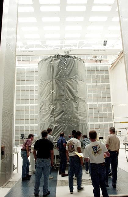 NASA image: KENNEDY SPACE CENTER, FLA. -  At Cape Canaveral Air Force Station, the Space Infrared Telescope Facility (SIRTF) observatory is moved into NASA Spacecraft Hangar AE. SIRTF will remain in the clean room at Hangar AE until it returns to the pad in early August.