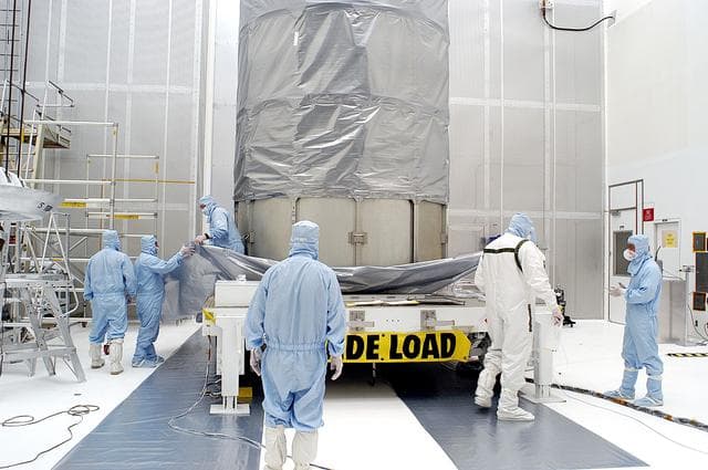 NASA image: KENNEDY SPACE CENTER, FLA. -  The Space Infrared Telescope Facility (SIRTF) has been returned to NASA Spacecraft Hangar AE from the launch pad.   It will remain in the clean room until it returns to the pad in early August.  One of NASA's largest infrared telescopes to be launched, SIRTF will obtain images and spectra by detecting the infrared energy, or heat, radiated by objects in space.