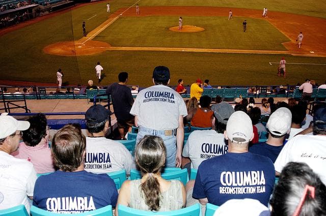 NASA image: KENNEDY SPACE CENTER, FLA. -  KSC employees enjoy a baseball game at Manatees Stadium, home of the Brevard Manatees, a minor league baseball team in Central Florida.  The team hosted KSC employees for the game, which included a moment of silence to honor the STS-107 crew and two recovery workers who died in a helicopter crash.