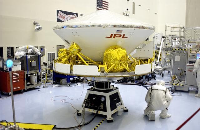 NASA image: KENNEDY SPACE CENTER, FLA. - The Mars Exploration Rover 2 (MER-2) is ready for a second spin test in the Payload Hazardous Servicing Facility.  After mating to the third stage of the Delta II rocket, MER-2 will be transported to the launch pad.  NASA’s twin Mars Exploration Rovers are designed to study the history of water on Mars. These robotic geologists are equipped with a robotic arm, a drilling tool, three spectrometers, and four pairs of cameras that allow them to have a human-like, 3D view of the terrain. Each rover could travel as far as 100 meters in one day to act as Mars scientists' eyes and hands, exploring an environment where humans can’t yet go.  The MER-2 is scheduled to launch June 5 from Launch Pad 17-A, Cape Canaveral Air Force Station.