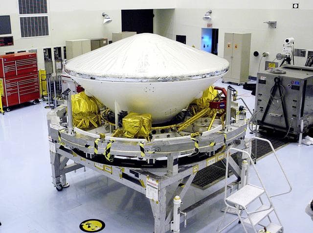 NASA image: KENNEDY SPACE CENTER, FLA. - In the Payload Hazardous Servicing Facility, the Mars Exploration Rover-1 (MER-B) awaits the next step in its preflight processing.  The rover is scheduled to launch aboard a Delta II rocket on June 25.  NASA’s twin Mars Exploration Rovers are designed to study the history of water on Mars. These robotic geologists are equipped with a robotic arm, a drilling tool, three spectrometers, and four pairs of cameras that allow them to have a human-like, 3D view of the terrain. Each rover could travel as far as 100 meters in one day to act as Mars scientists' eyes and hands, exploring an environment where humans are not yet able to go. The launch of MER-2 (MER-A) is tentatively set for June 8.