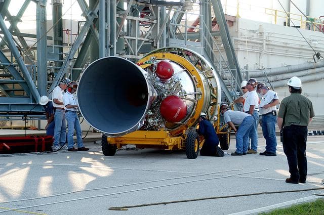 NASA image: KENNEDY SPACE CENTER, FLA. - The second stage of a Delta II rocket arrives at Pad 17-B, Cape Canaveral Air Force Station. It will be mated to the Delta first stage already at the pad in preparation for the launch of the Mars Exploration Rover-1 (MER-B) on June 25.  NASA’s twin Mars Exploration Rovers are designed to study the history of water on Mars. These robotic geologists are equipped with a robotic arm, a drilling tool, three spectrometers, and four pairs of cameras that allow them to have a human-like, 3D view of the terrain. Each rover could travel as far as 100 meters in one day to act as Mars scientists' eyes and hands, exploring an environment where humans are not yet able to go. The launch of MER-2 (MER-A) is tentatively set for June 8.