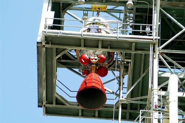NASA image: KENNEDY SPACE CENTER, FLA. - The second stage of a Delta II rocket is lifted to the top of the launch tower on Pad 17-B, Cape Canaveral Air Force Station.  It will be mated to the Delta first stage already at the pad in preparation for the launch of the Mars Exploration Rover-1 (MER-B) on June 25.  NASA’s twin Mars Exploration Rovers are designed to study the history of water on Mars. These robotic geologists are equipped with a robotic arm, a drilling tool, three spectrometers, and four pairs of cameras that allow them to have a human-like, 3D view of the terrain. Each rover could travel as far as 100 meters in one day to act as Mars scientists' eyes and hands, exploring an environment where humans are not yet able to go. The launch of MER-2 (MER-A) is tentatively set for June 8.