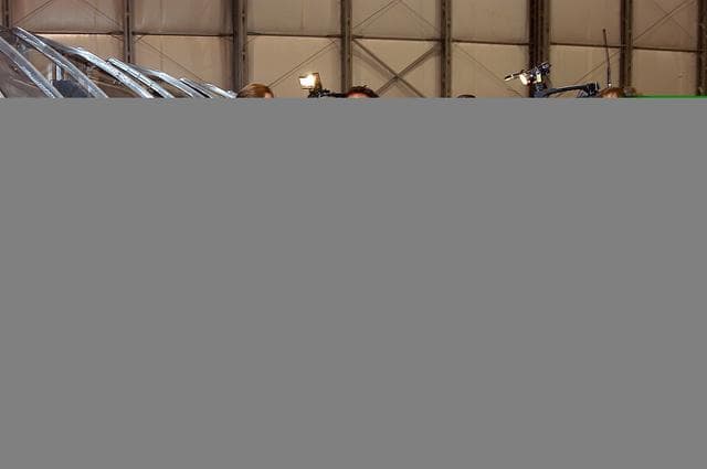 KENNEDY SPACE CENTER, FLA. -  In the Columbia Debris Hangar,  Shuttle Launch Director Mike Leinbach  talks to the media about activities that have taken place since the Columbia accident on Feb. 1, 2003.  Behind him is a model of the left wing of the orbiter.  STS-107 debris recovery and reconstruction operations are winding down.  To date, nearly 84,000 pieces of debris have been recovered and sent to KSC. That represents about 38 percent of the dry weight of Columbia, equaling almost 85,000 pounds.