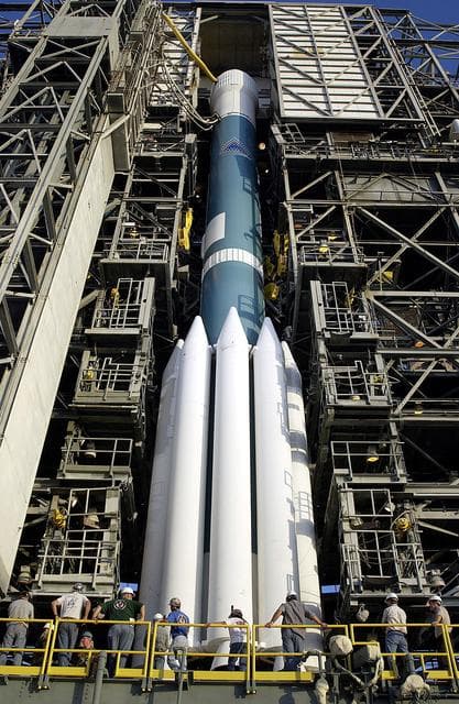 NASA image: KENNEDY SPACE CENTER, FLA. -  The Mobile Service Tower is rolled back at Launch Complex 17A to reveal a Delta II rocket ready to launch the Mars Exploration Rover-A mission.  NASA's twin Mars Exploration Rovers are designed to study the history of water on Mars. These robotic geologists are equipped with a robotic arm, a drilling tool, three spectrometers, and four pairs of cameras that allow them to have a human-like, 3D view of the terrain. Each rover could travel as far as 100 meters in one day to act as Mars scientists' eyes and hands, exploring an environment where humans are not yet able to go. MER-A, with the rover Spirit aboard, is scheduled to launch on June 8 at 2:06 p.m. EDT, with two launch opportunities each day during a launch period that closes on June 24.
