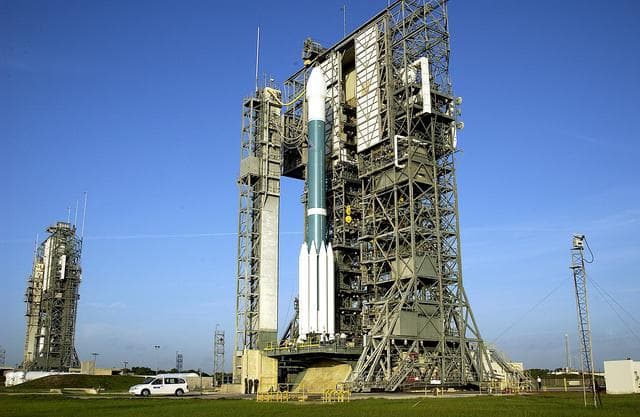 NASA image: KENNEDY SPACE CENTER, FLA. -  The Mobile Service Tower is rolled back at Launch Complex 17A to reveal a Delta II rocket ready to launch the Mars Exploration Rover-A mission.  NASA's twin Mars Exploration Rovers are designed to study the history of water on Mars. These robotic geologists are equipped with a robotic arm, a drilling tool, three spectrometers, and four pairs of cameras that allow them to have a human-like, 3D view of the terrain. Each rover could travel as far as 100 meters in one day to act as Mars scientists' eyes and hands, exploring an environment where humans are not yet able to go. MER-A, with the rover Spirit aboard, is scheduled to launch on June 8 at 2:06 p.m. EDT, with two launch opportunities each day during a launch period that closes on June 24.